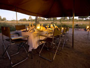 Dinner at an Adventurer mobile safari camp comes with a view from comfortable canvas folding chairs.