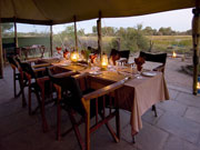 Dining at a Discoverer mobile safari camp includes stunning wilderness views.